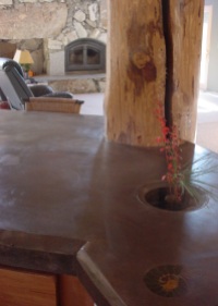concrete countertops and stone fireplace